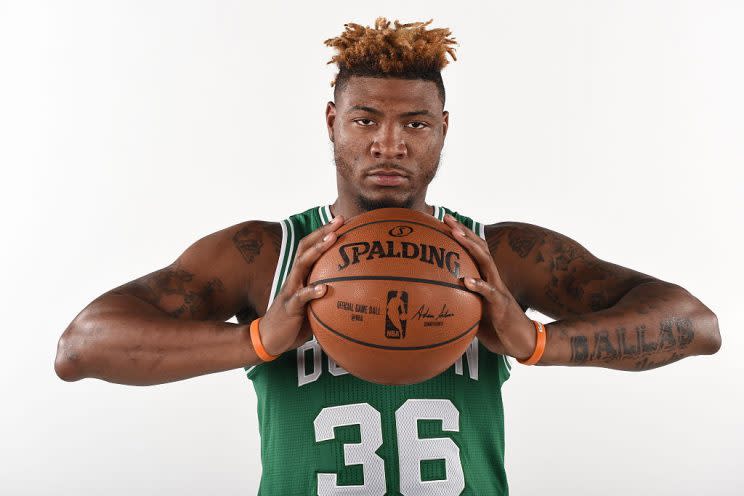 Can Marcus Smart squeeze anything more out of this here basketball. (Getty Images)