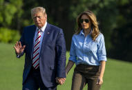 U.S. President Donald Trump waves as he and First lady Melania Trump walk on the South Lawn of the White House after arriving on Marine One in Washington, D.C., U.S., on Sunday, August 4, 2019. (Photo by Sipa USA)