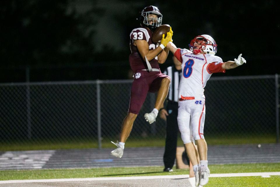 First Baptist Academy's Preston Shemansky (33) catches the ball during the Class 2A-Region 3 football Championship between FBA and Northside Christian on Friday, Nov. 26, 2021 at First Baptist Academy in Naples, Fla. 