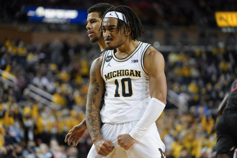 Michigan guard Frankie Collins (10) reacts to his basket against San Diego State in the second half of an NCAA college basketball game in Ann Arbor, Mich., Saturday, Dec. 4, 2021. (AP Photo/Paul Sancya)