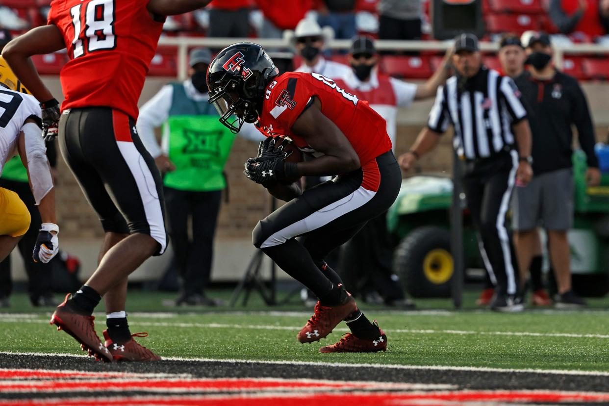 Texas Tech wide receiver Trey Cleveland scores a touchdown during the Red Raiders' victory against West Virginia two years ago at Jones AT&T Stadium, where the same two teams square off again Saturday. Cleveland has emerged as a big playmaker for the Red Raiders in recent weeks.