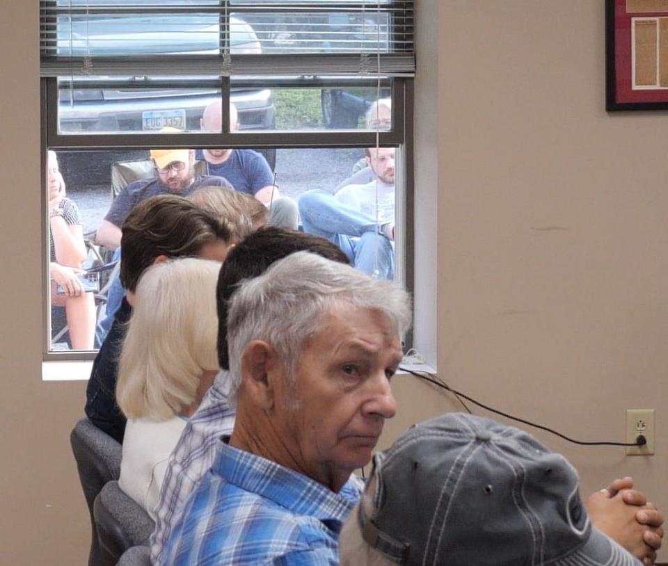 Community interest in the July 19 St. Albans Township Board of Zoning Appeals was so strong that residents sat in lawn chairs outside the meeting place and listened to the meeting on a loudspeaker.