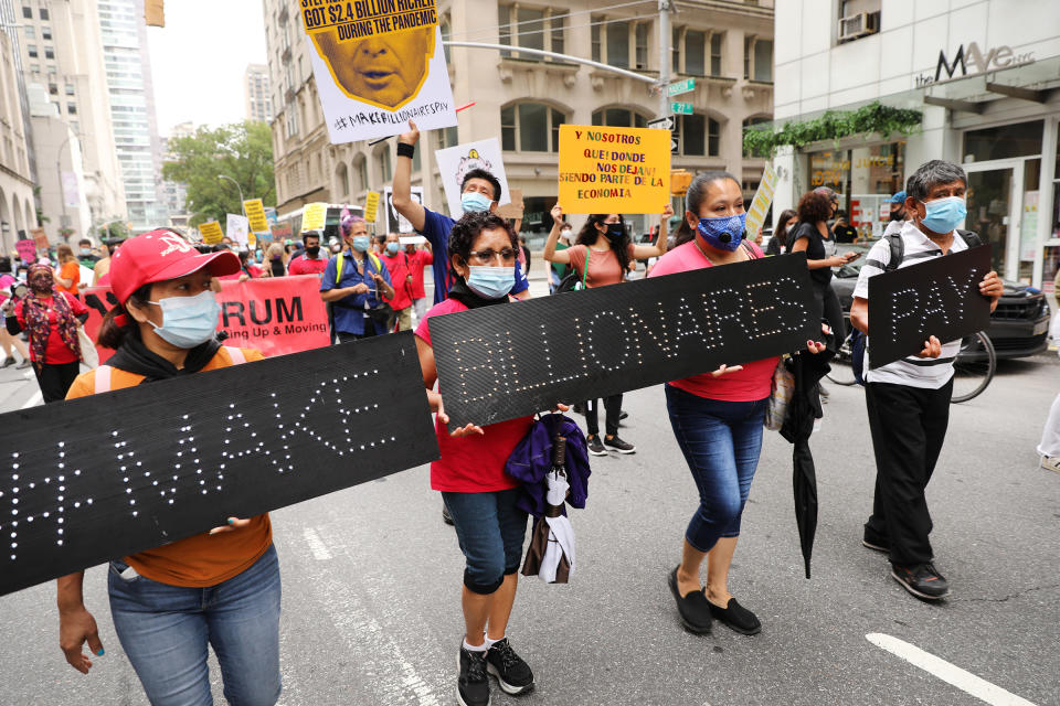 People participate in a "March on Billionaires" event on July 17 in New York City<span class="copyright">Spencer Platt—Getty Images.</span>