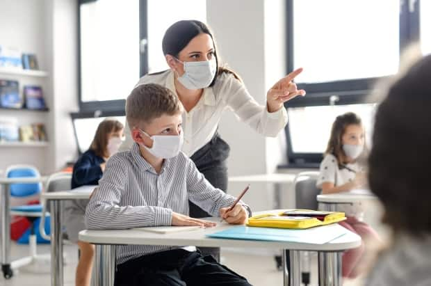 Many of the province's school boards are speeding up hiring processes so that new Alberta bachelor of education graduates can help fill an increase in teacher vacancies brought on by the COVID-19 pandemic. (Halfpoint/Shutterstock - image credit)