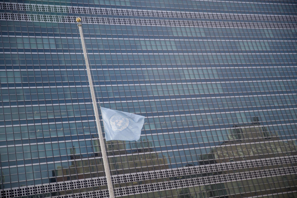 The United Nations flag flies at half staff in honor of former Secretary-General Kofi Annan at U.N. headquarters, Saturday, Aug. 18, 2018. Annan, one of the world's most celebrated diplomats and a charismatic symbol of the United Nations who rose through its ranks to become the first black African secretary-general, has died. He was 80. (AP Photo/Mary Altaffer)
