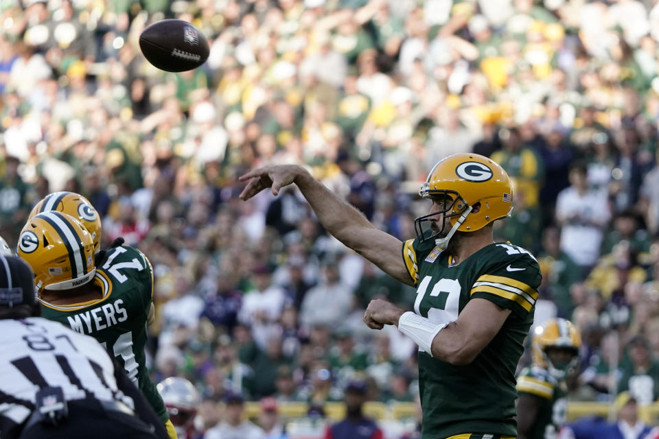 Green Bay Packers quarterback Aaron Rodgers throws a pass during the second half of an NFL football game against the New England Patriots, Sunday, Oct. 2, 2022, in Green Bay, Wis. (AP Photo/Morry Gash)