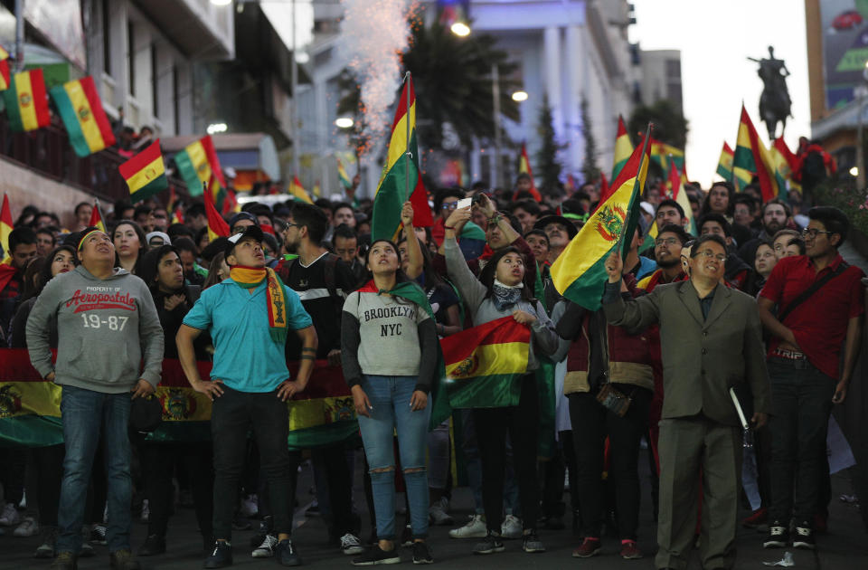 Anti-government protesters march demanding a second round presidential election, in La Paz, Bolivia, Saturday, Oct. 26, 2019. Bolivia's official vote tally was revealed Friday pointing to an outright win for incumbent Evo Morales in a disputed presidential election that has triggered protests and growing international pressure on the Andean nation to hold a runoff ballot. (AP Photo/Juan Karita)