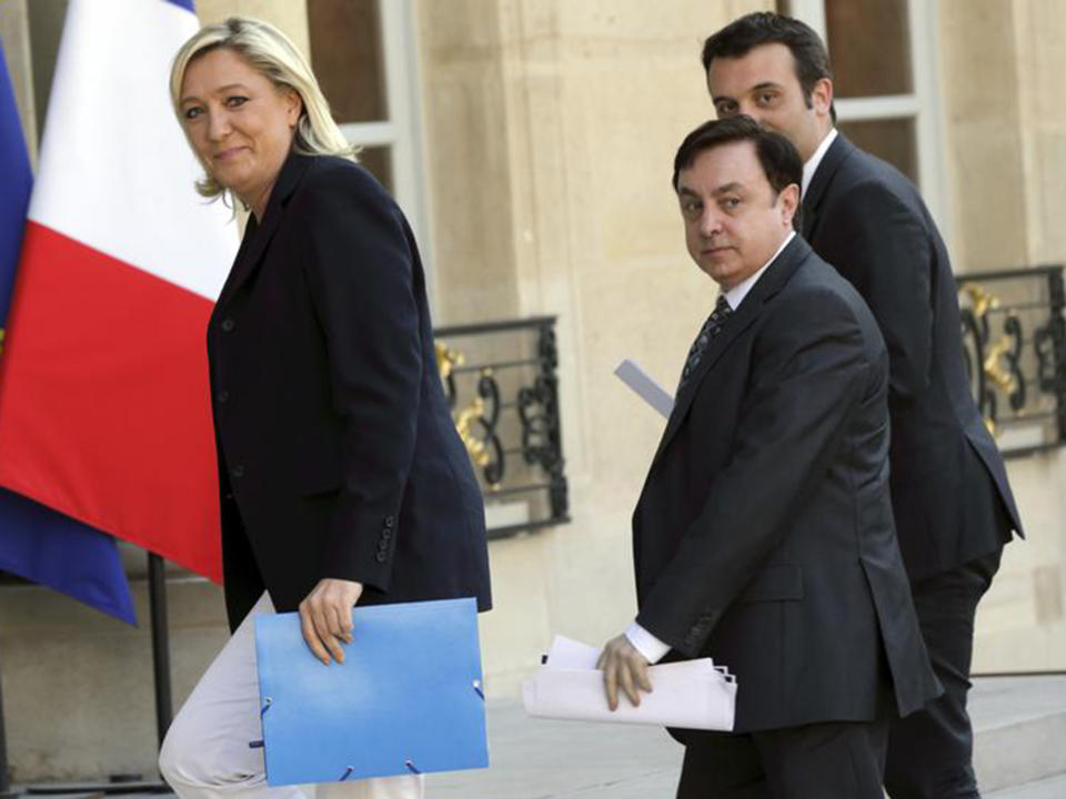 Marine Le Pen arrives at the Elysee Palace in Paris with National Front Vice-Presidents Jean-Francois Jalkh (centre) and Florian Philippot: REUTERS/Philippe Wojazer