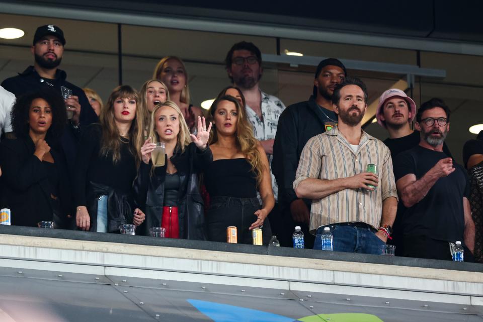 Taylor Swift, Brittany Mahomes, Blake Lively, Ryan Reynolds, and Hugh Jackman watch from the stands during an NFL football game between the New York Jets and the Kansas City Chiefs at MetLife Stadium on October 1, 2023.