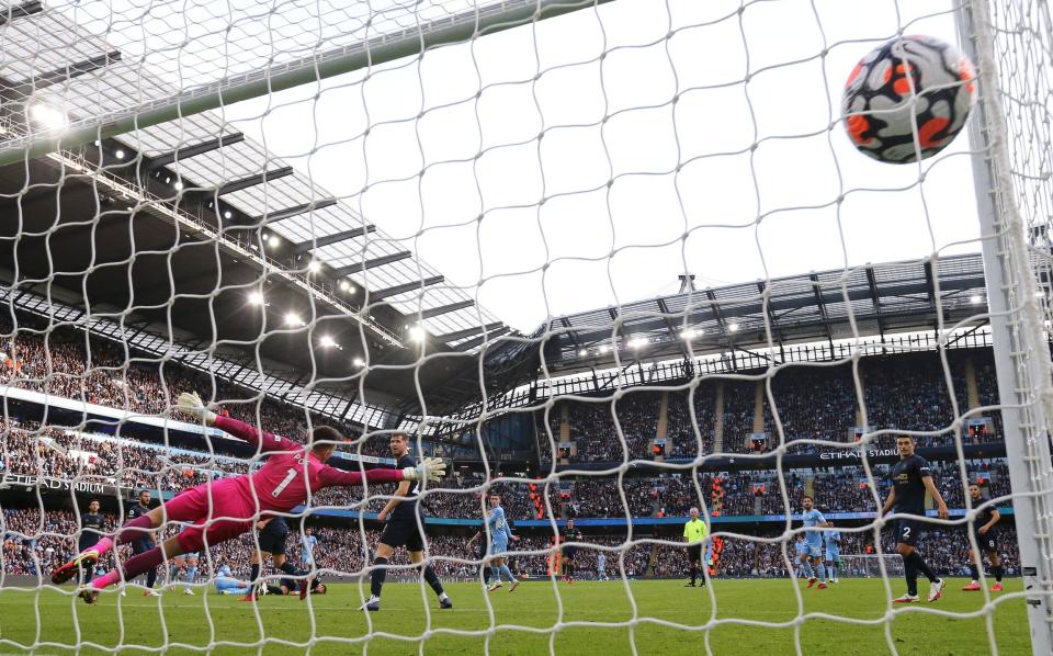 A familiar sight as De Bruyne tucks the ball into the bottom corner, this time in the win over Burnley - Getty Images