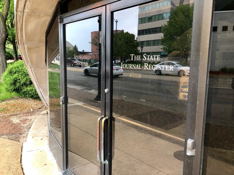 An entrance to the office building of the State Journal Register is seen, Tuesday, May 14, 2019, in Springfield, Ill. Illinois' capital-city newspaper, a 188-year-old institution tied intimately to Abraham Lincoln, is without a news chief after its editor resigned in hopes of sparing more layoffs, according to a staff writer. Angie Muhs served notice of her resignation on Friday, May 10. (AP Photo/John O'Connor)