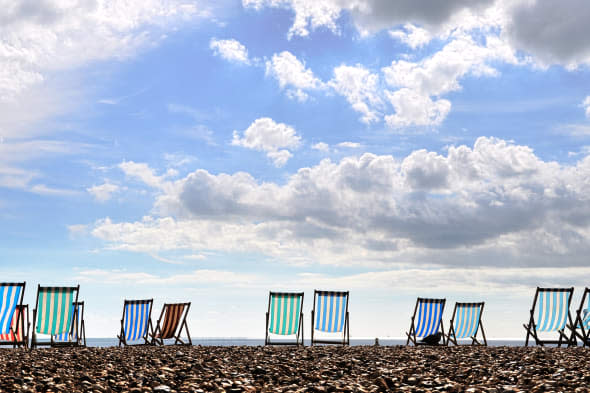 deck chairs on brighton beach ...