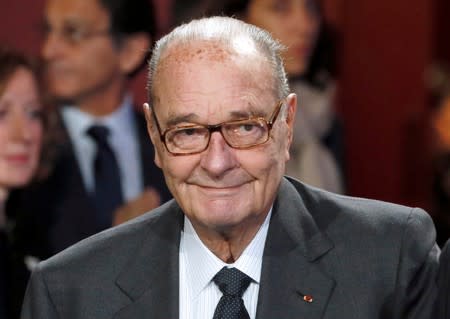 FILE PHOTO: Former French President Jacques Chirac arrives to attend the award ceremony for the Prix de la Fondation Chirac at the Quai Branly Museum in Paris