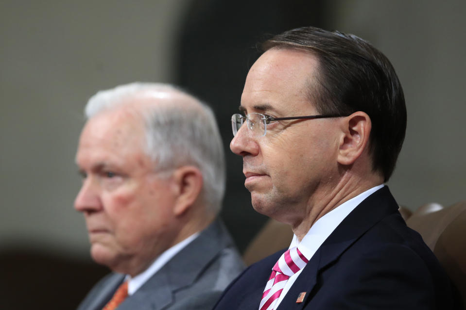 Attorney General Jeff Sessions, left, and Deputy Attorney General Rod Rosenstein, listen to remarks during a Religious Liberty Summit at the Department of Justice, Monday, July 30, 2018. (AP Photo/Manuel Balce Ceneta)