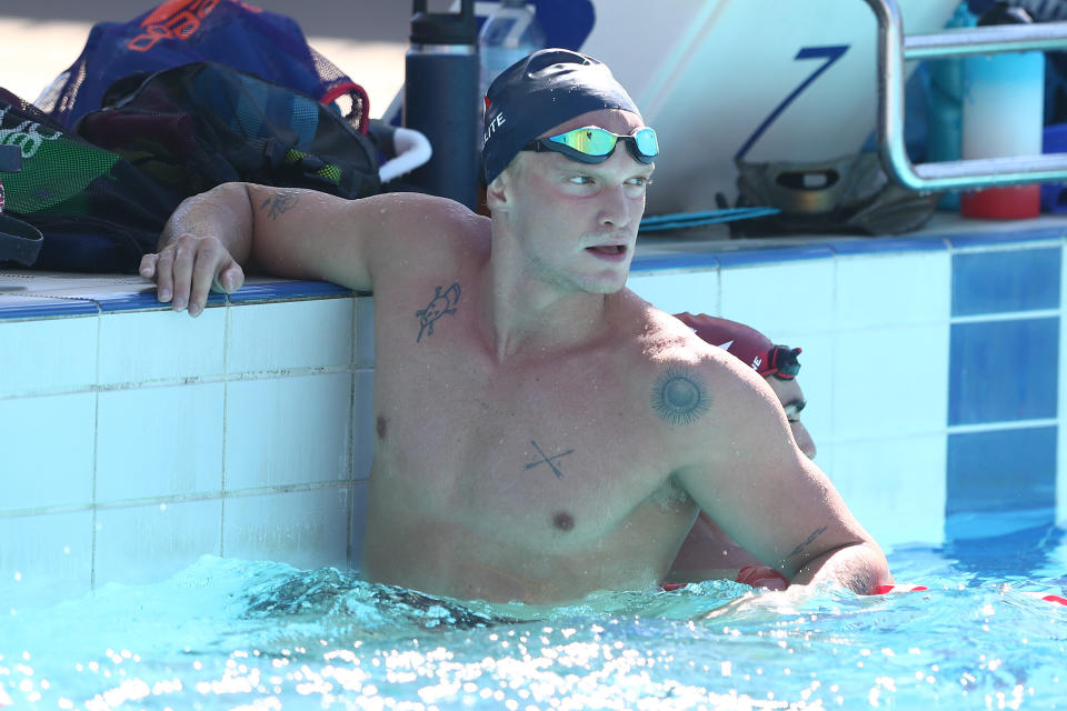 Cody Simpson finishing a swim during a training session.