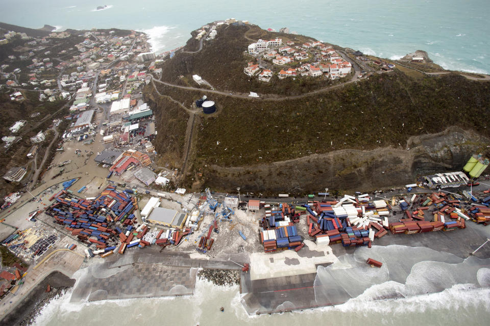 <p>A view of St. Maarten, in the aftermath of Hurricane Irma. Irma cut a path of devastation across the northern Caribbean, leaving thousands homeless after destroying buildings and uprooting trees on Sept. 6, 2017. (Photo: Gerben Van Es/Dutch Defense Ministry via AP) </p>