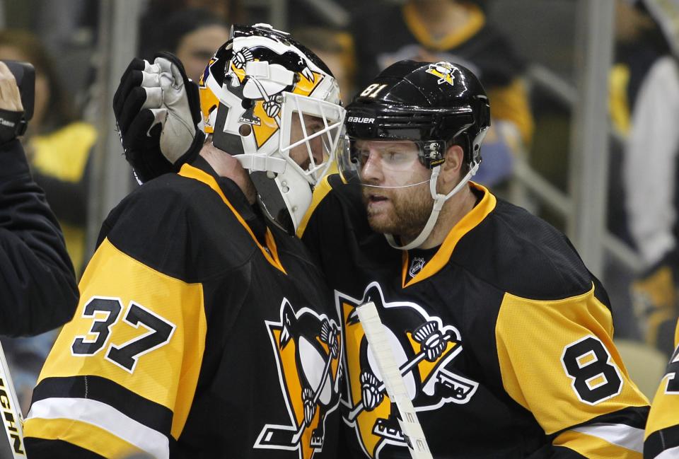 PITTSBURGH, PA - APRIL 13:  Jeff Zatkoff #37 of the Pittsburgh Penguins and Phil Kessel #81 celebrate after defeating the New York Rangers 5-2 in Game One of the Eastern Conference Quarterfinals during the 2016 NHL Stanley Cup Playoffs at Consol Energy Center on April 13, 2016 in Pittsburgh, Pennsylvania.  (Photo by Justin K. Aller/Getty Images)