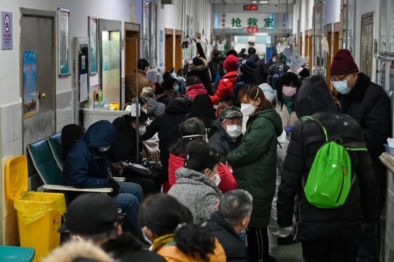 Crowds wait for medical attention at Wuhan Red Cross Hospital in January 2020, when the outbreak was still raging in the Chinese city