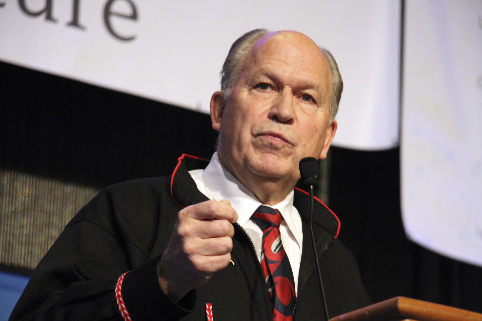 Alaska Gov. Bill Walker addresses delegates at the annual Alaska Federation of Natives conference in Anchorage, Alaska, on Thursday, Oct. 18, 2018. Walker says his re-election campaign is moving ahead but says he's taking it "a day at a time" just days after the abrupt resignation of Lt. Gov. Byron Mallott over what Walker has described as an inappropriate overture to a woman. (AP Photo/Mark Thiessen)
