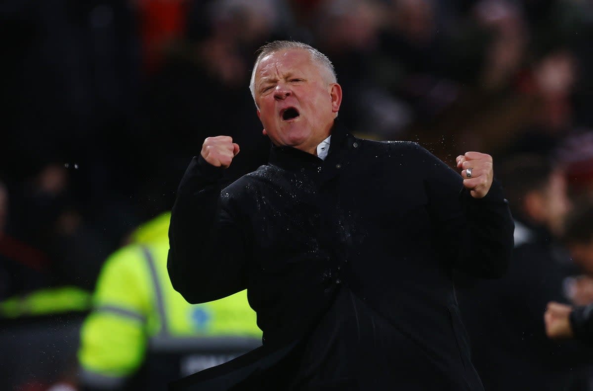 Passion: Chris Wilder celebrates his first win back in charge at Bramall Lane (Action Images via Reuters)