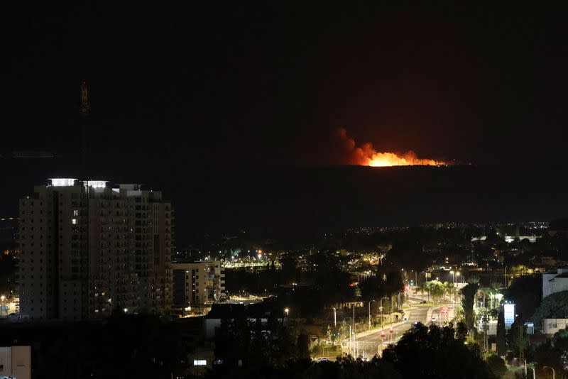 A view shows smoke and fire in Lebanon, near the border with Israel, as seen from Nahariya in northern Israel