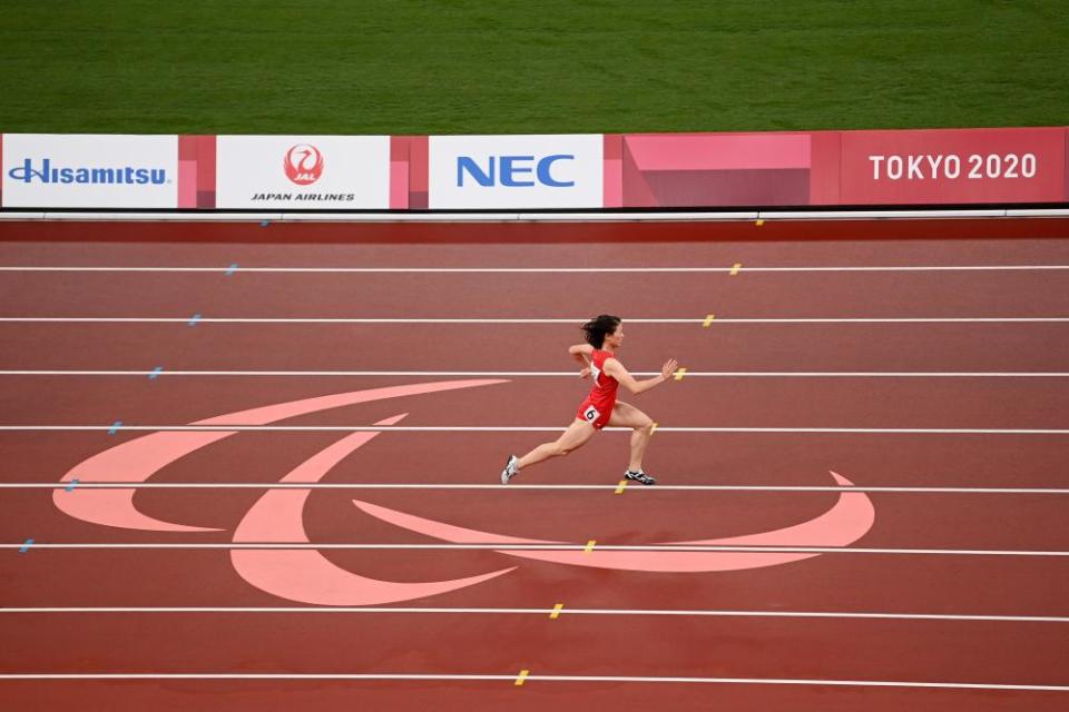 Yiting Shi of China all alone out front in her T36 100m final.