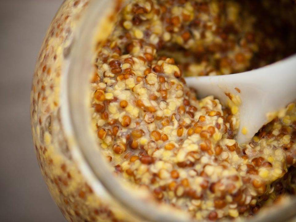 whole grain mustard jar with small spoon