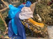 Objects lie around the grave of a 19-year-old protester, Kyal Sin, in Mandalay