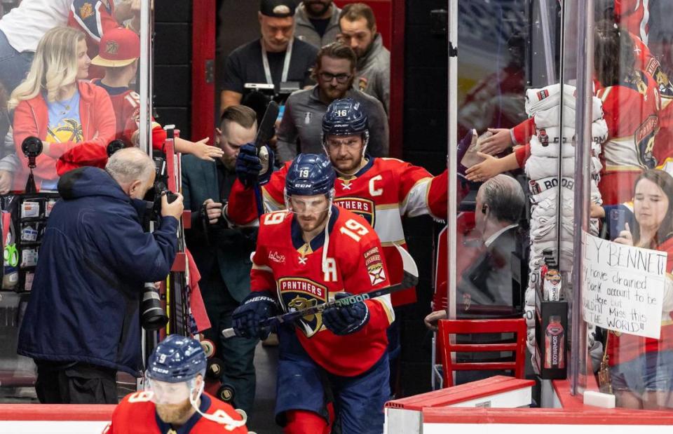 Florida Panthers left wing Matthew Tkachuk (19) and center Aleksander Barkov (16) make their way onto the ice to warm up before the start of Game 3 against the New York Rangers during the Eastern Conference finals of the NHL Stanley Cup playoffs at Amerant Bank Arena on Sunday, May 26, 2024, in Sunrise, Fla.