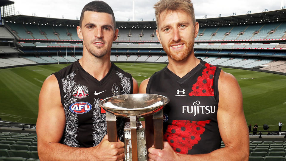 Scott Pendlebury and Dyson Heppell, pictured here in their Anzac Day strips.