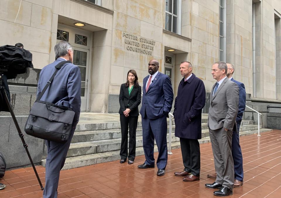 Assistant U.S. Attorney Emily Glatfelter, left, is the lead prosecutor in the public corruption case against former Ohio House speaker Larry Householder. U.S. Attorney Ken Parker, center left, and FBI Special Agent in Charge Will Rivers, center right, lead the teams that investigated the case and filed criminal charges.