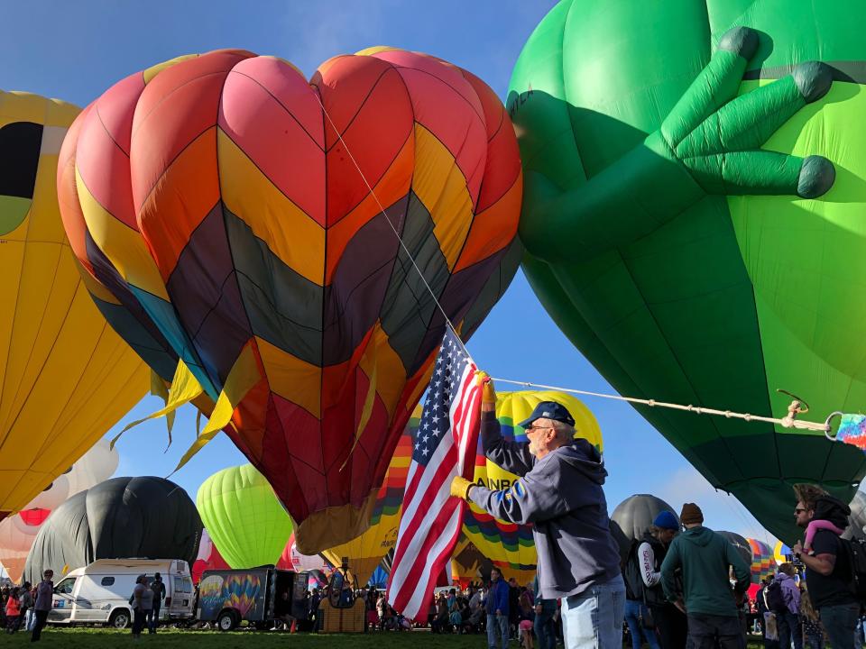 Hot air balloons are inflated during the annual Albuquerque International Balloon Fiesta in Albuquerque, N.M., on Saturday, Oct. 5, 2019. Organizers are expecting tens of thousands of spectators for opening weekend and exponentially more over the course of the nine-day event. (AP Photo/Susan Montoya Bryan)