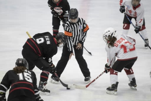 The Harbin women's ice hockey team face off against Guangzhou at China's national ice hockey championships in Beijing