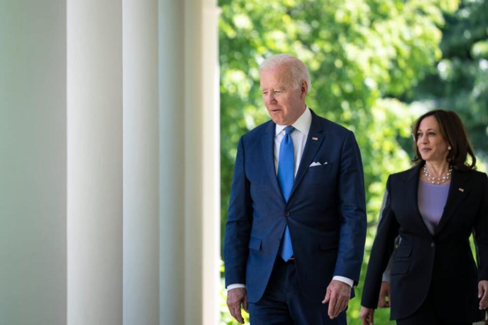 (L-R) U.S. President Joe Biden and Vice President Kamala Harris walk to the Rose Garden for an event on high speed internet access for low-income Americans, at the White House May 9, 2022 in Washington, DC. (Photo by Drew Angerer/Getty Images)