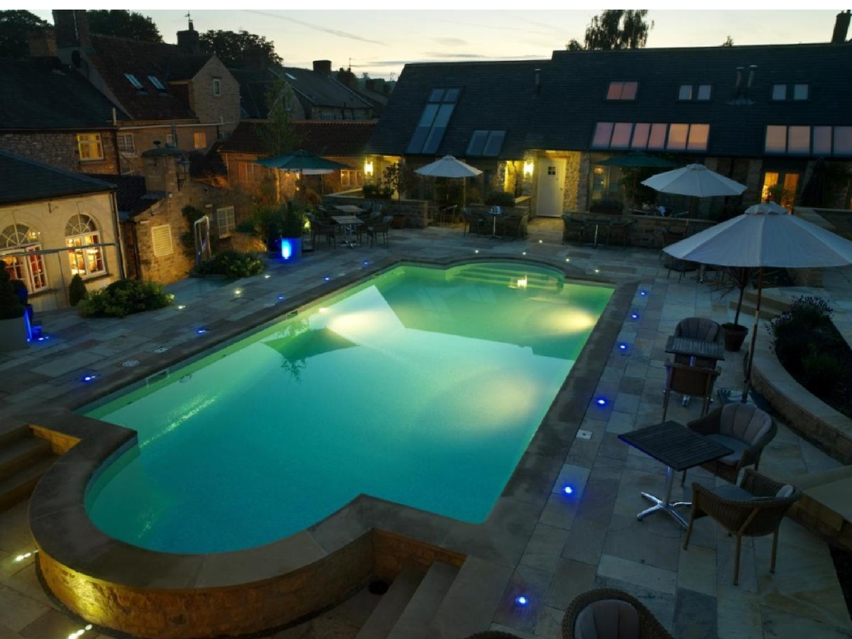 The outdoor pool at The Feversham arms is heated and there’s a hot tub nearby, too (Feversham Hotel)