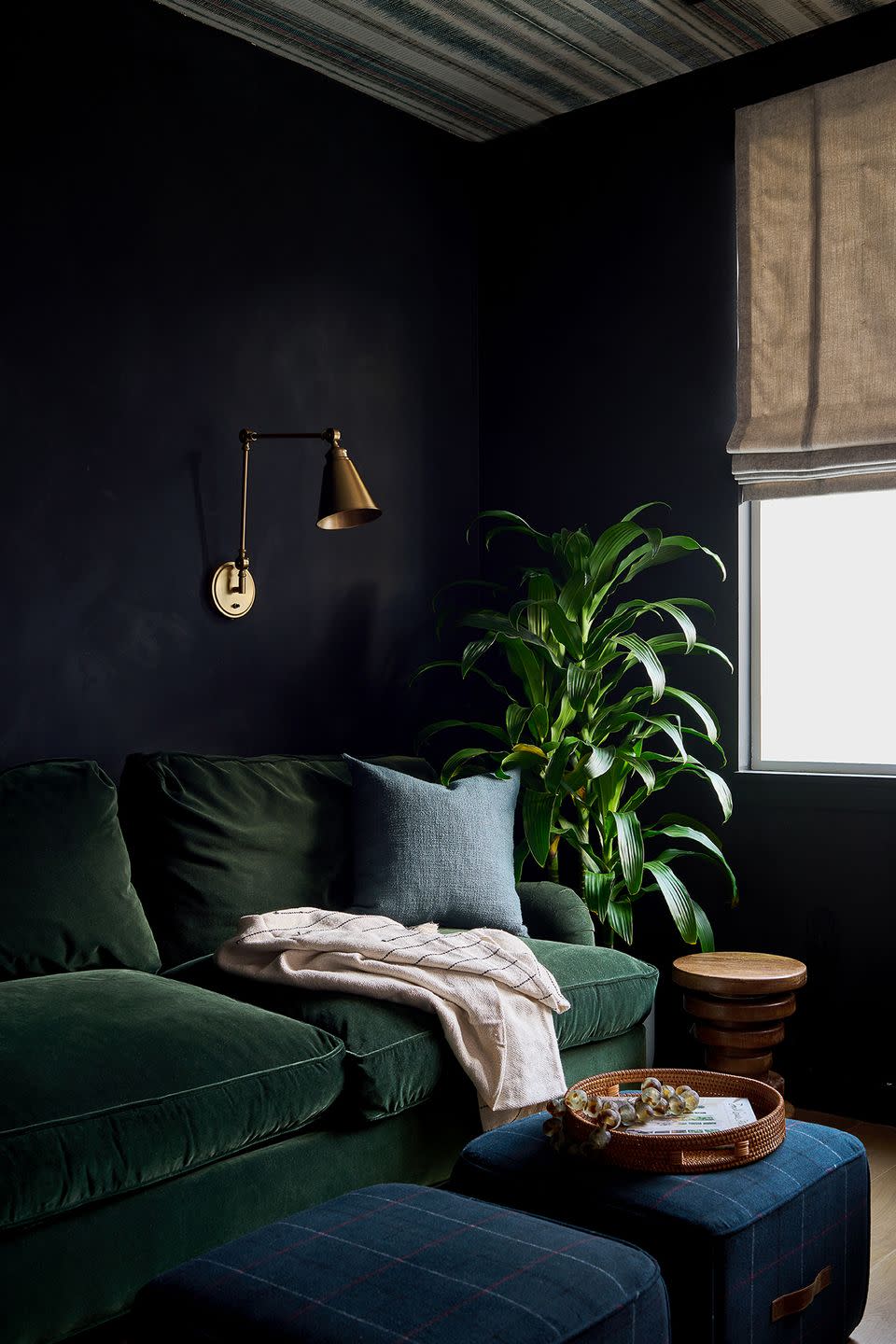 lounge area in an office with couches and ottomans