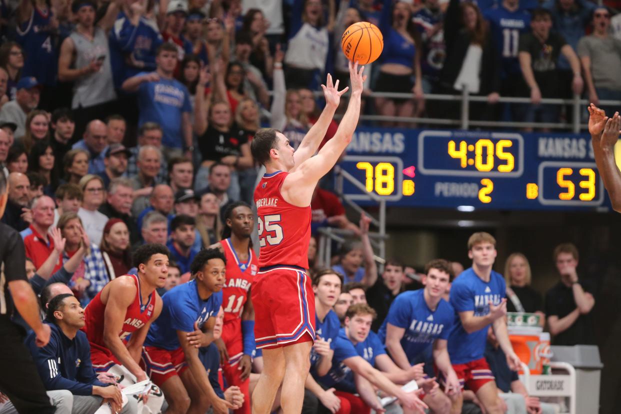 Kansas graduate senior guard Nicolas Timberlake (25) shoots for three against Kansas State in the second half of the Sunflower Showdown inside Allen Fieldhouse on Tuesday.