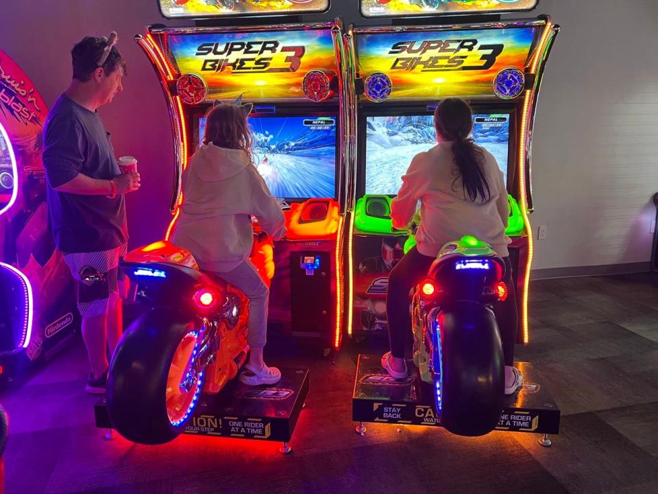 Northern Lights Arcade in Great Wolf Lodge, Two people on bike games 