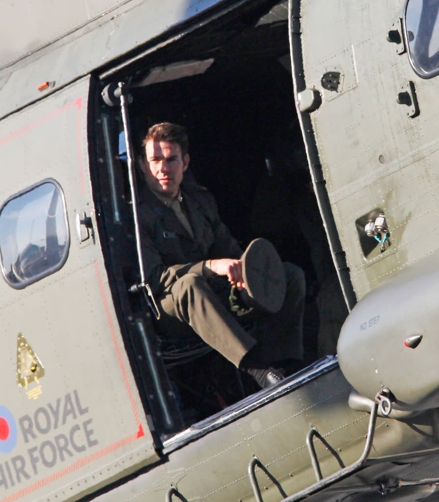 Tom Cruise is sighted flying in a helicopter on set for the movie 'All You Need Is Kill' being filmed in Trafalgar Square on November 25, 2012 in London, England.