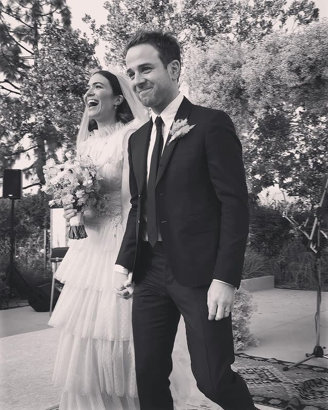 <p>They held their intimate wedding in Mandy's Pasadena, CA backyard. "It was boho chic and very romantic," a source told <em><a href="https://people.com/tv/mandy-moore-taylor-goldsmith-wedding-photos/" rel="nofollow noopener" target="_blank" data-ylk="slk:People;elm:context_link;itc:0;sec:content-canvas" class="link ">People</a></em>. There was pink décor, feathers, flower arrangements, and candles. And, Mandy's wedding gown was pink.</p><p>Then, Mandy changed into a black dress for the reception at Fig House in Los Angeles. “It was a fun and very relaxed reception,” a source told the publication. “Guests eat, drank and danced. Mandy looked ecstatic and stunning.” Mandy and her new husband performed together on stage.</p><p><a href="https://www.instagram.com/p/BqYGsWfAcbt/" rel="nofollow noopener" target="_blank" data-ylk="slk:See the original post on Instagram;elm:context_link;itc:0;sec:content-canvas" class="link ">See the original post on Instagram</a></p>