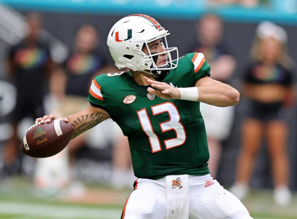 Miami Hurricanes quarterback Jake Garcia (13) sets up to pass during the second quarter of their ACC football game against the Central Connecticut State Blue Devils at Hard Rock Stadium on Saturday, September 25, 2021 in Miami Gardens, Florida.