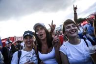 <p>A Russian football fans react and cheer as they watch the Russia 2018 World Cup Group A football match between Russia and Saudi Arabia at the Fan zone in Kaliningrad on June 14, 2018. (Photo by Ozan KOSE / AFP) </p>