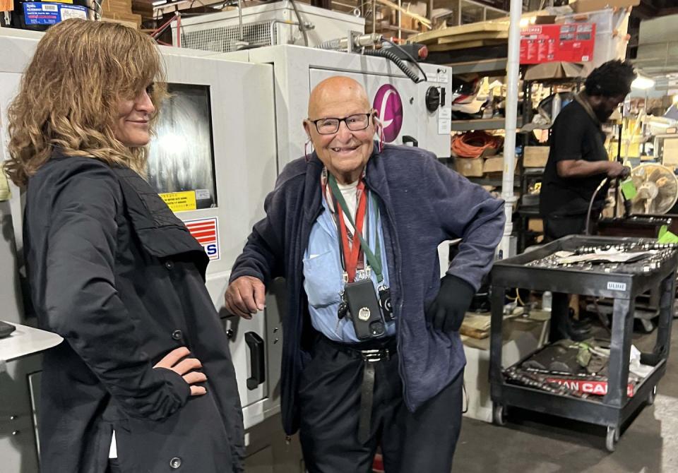 a man and a woman at a store