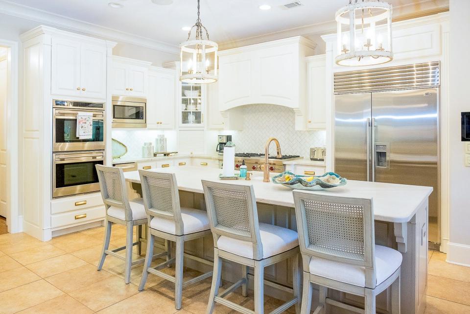The kitchen’s countertops were upgraded soon after the family took possession of the home.