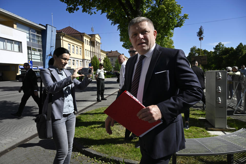 Slovakia's Prime Minister Robert Fico arrives for a cabinet's away-from-home session in the town of Handlova, Slovakia, Wednesday, May, 15, 2024. Prime Minister Robert Fico was shot and injured after the away-from-home government meeting in Handlova, according to information confirmed by Parliamentary Vice-Chair Lubos Blaha, who suspended the House session. (Radovan Stoklasa/TASR via AP)