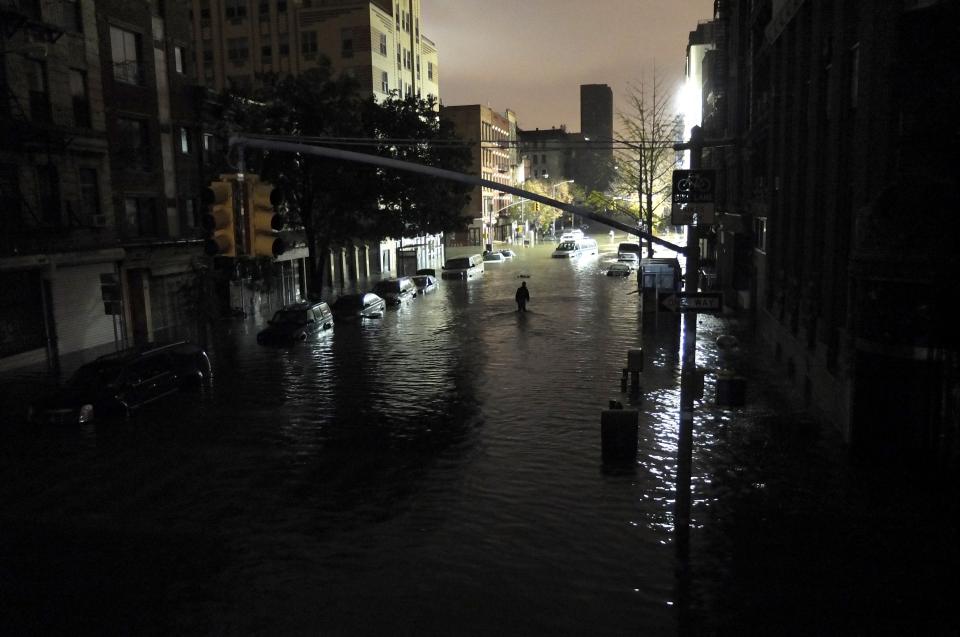 NEW YORK, NY - OCTOBER 30: A general view of submerged cars on Ave. C and 7th st, after severe flooding caused by Hurricane Sandy, on October 30, 2012 in Manhattan, New York. The storm has claimed at least 16 lives in the United States, and has caused massive flooding across much of the Atlantic seaboard. US President Barack Obama has declared the situation a 'major disaster' for large areas of the US East Coast including New York City, with wide spread power outages and significant flooding in parts of the city. (Photo by Christos Pathiakis/Getty Images)