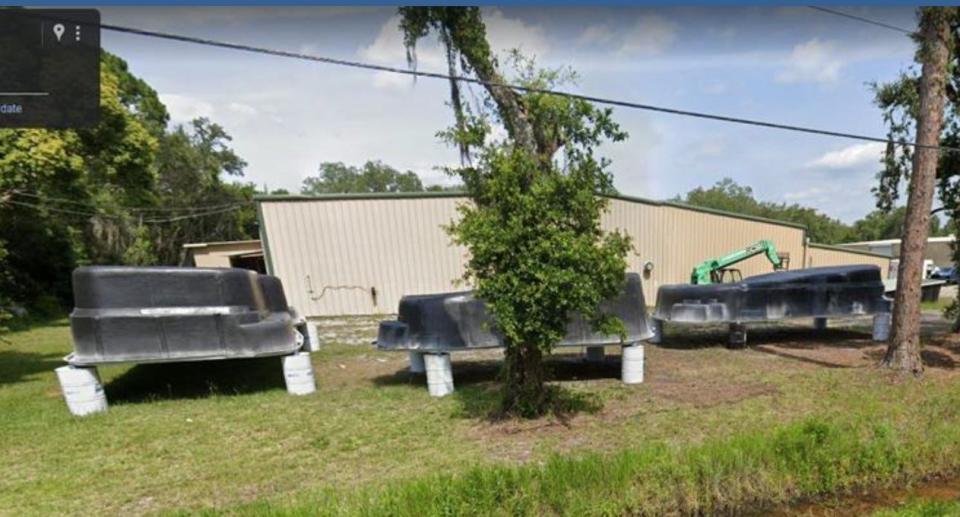 An image from a Volusia County government presentation shows pools outside of Rainforest Pools, a manufacturing business. County officials said the business violated county code by emitting "noxious" odors in the neighborhood during pool manufacturing.