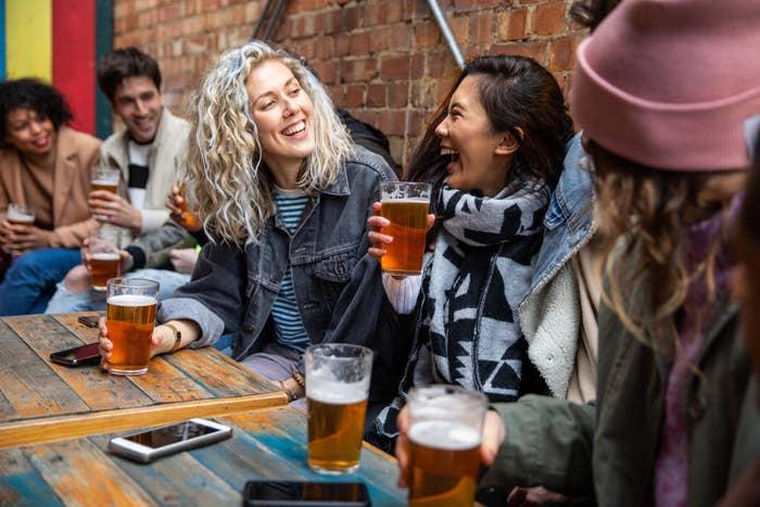 Londoners drinking in a pub.