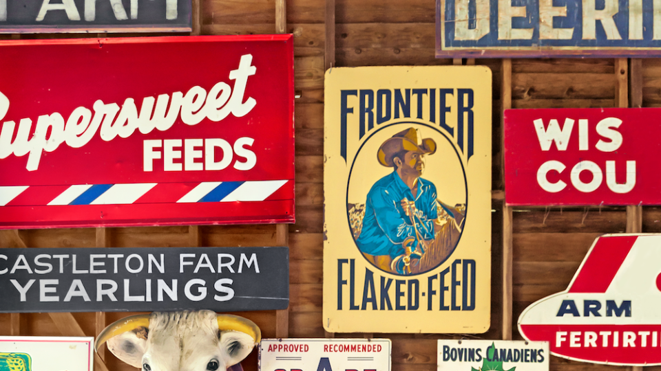vintage-farm-signs-gallery-wall-ideas-country-living