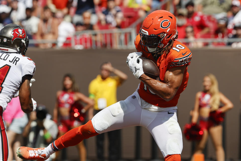 Chicago Bears wide receiver Chase Claypool (10) catches a touchdown pass during the second half of an NFL football game against the Tampa Bay Buccaneers, Sunday, Sept. 17, 2023, in Tampa, Fla. (AP Photo/Scott Audette)